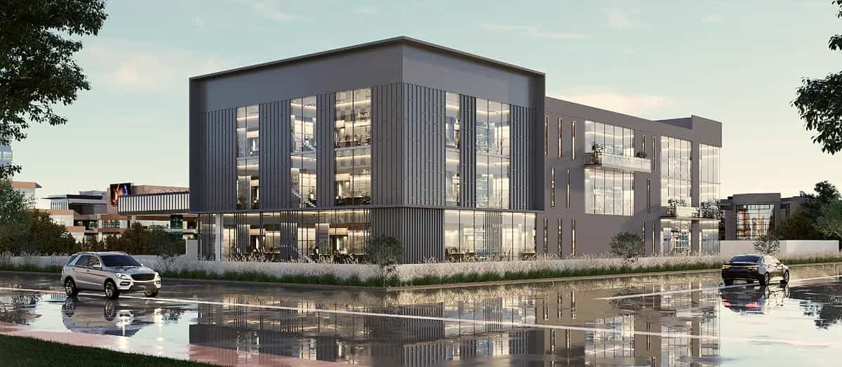 3D elevation of a three-storey commercial building with glass and grey cladding